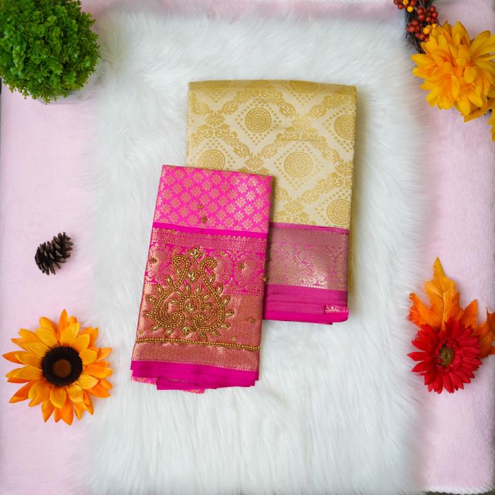 Silk gold and pink saree with aari designer blouse