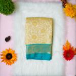 Silk gold and green saree with aari designer blouse