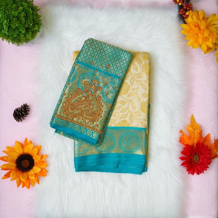 Silk gold and green saree with aari designer blouse